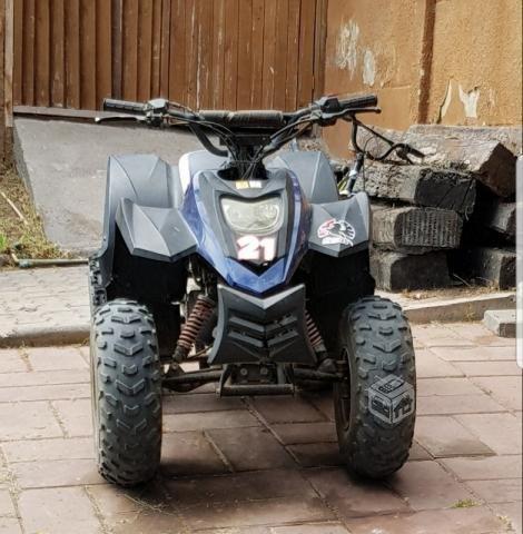 Moto 4 ruedas Trex