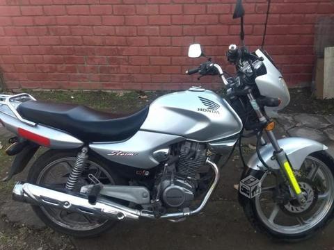 Busco: Moto honda storm 125 cc